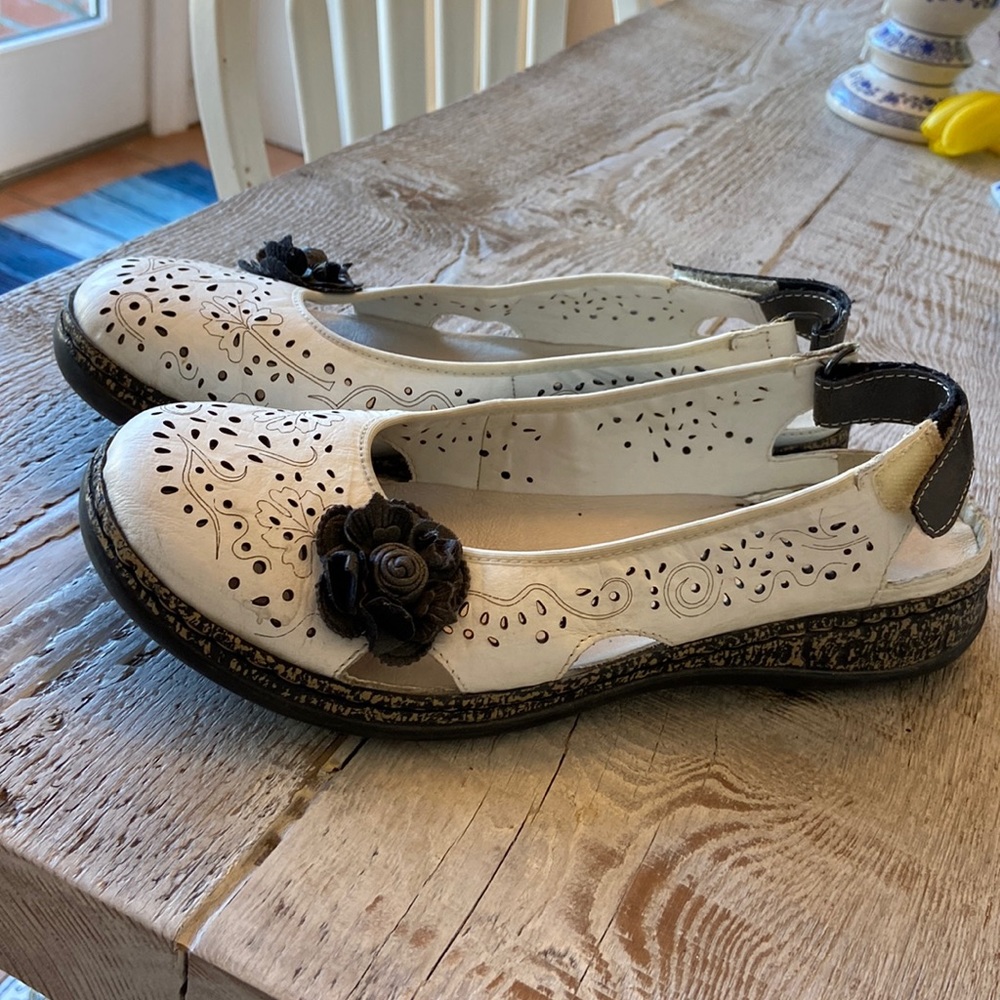 White Reiker shoes with little black flower